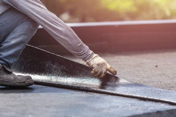 Professional Basement Waterproofing technician working in Peninsula, OH